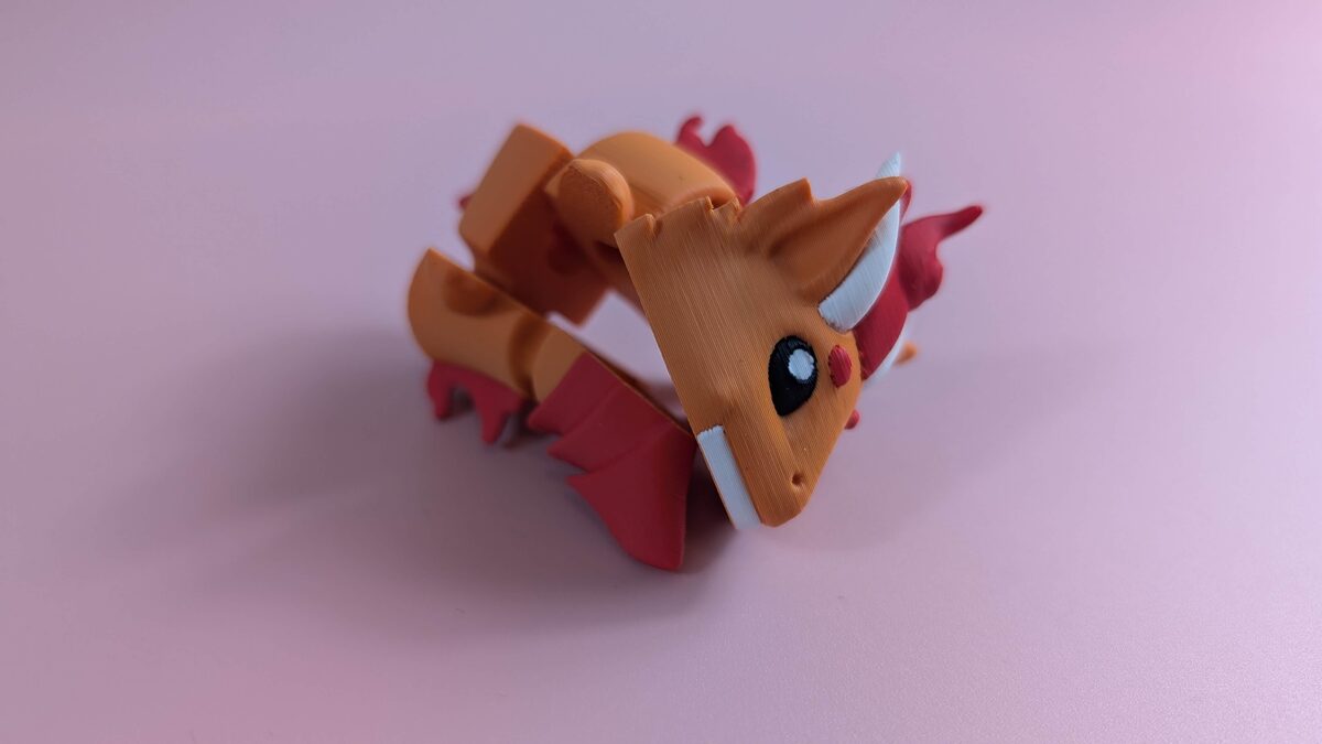 FIRE DRAGON - ARTICULATED FIGURE KEYCHAIN Rolled Up